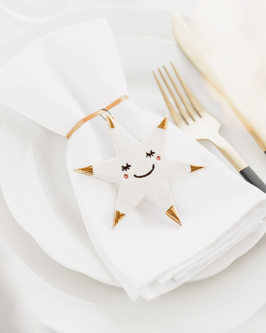 White Star Christmas Ornament with Smiley Face and Gold Tips