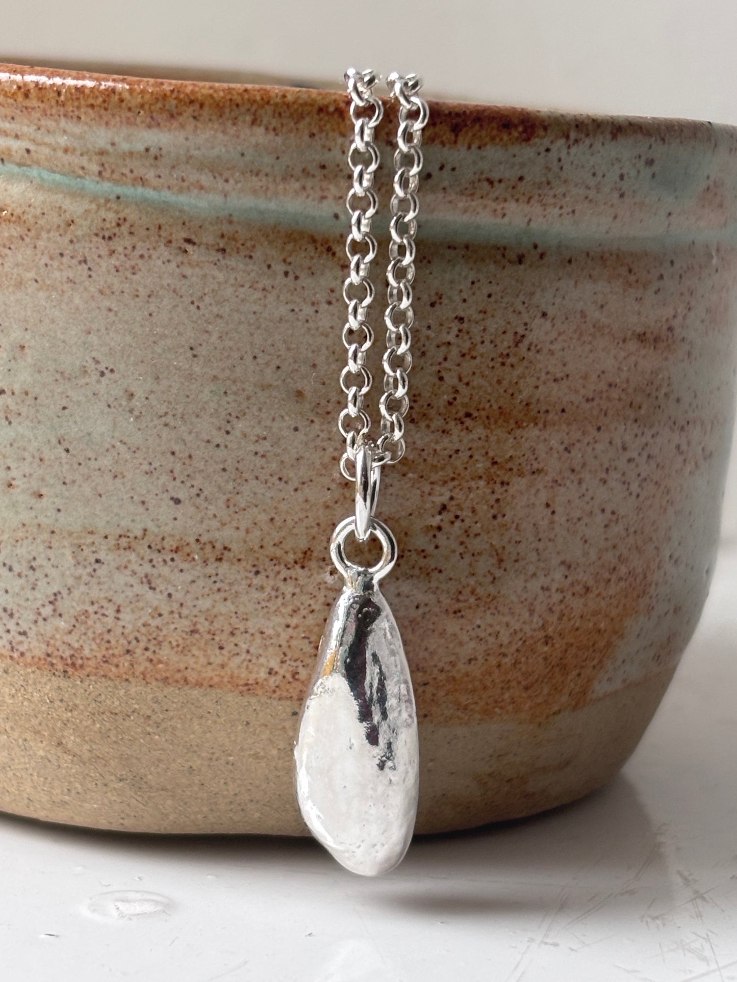 Scottish Beach Pebble Pendant In Silver