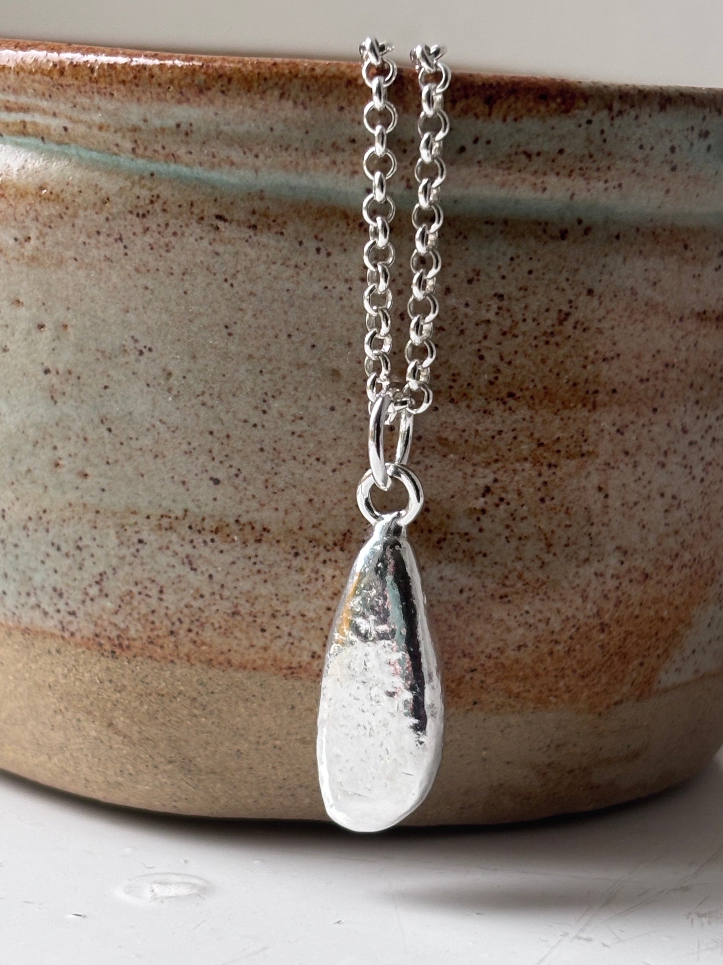 Scottish Beach Pebble Pendant In Silver