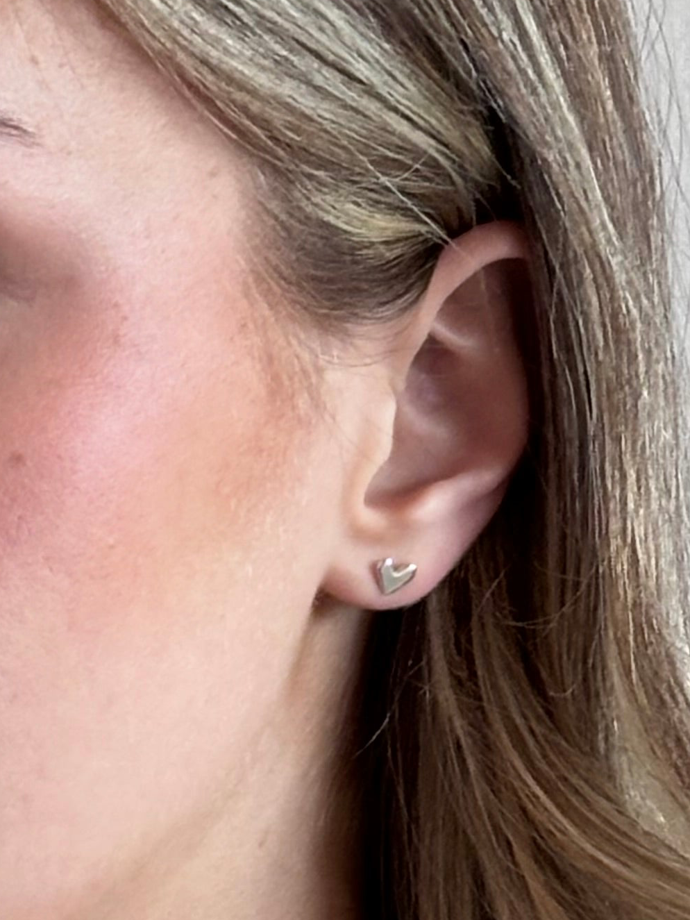 TINY SILVER HEART STUDS