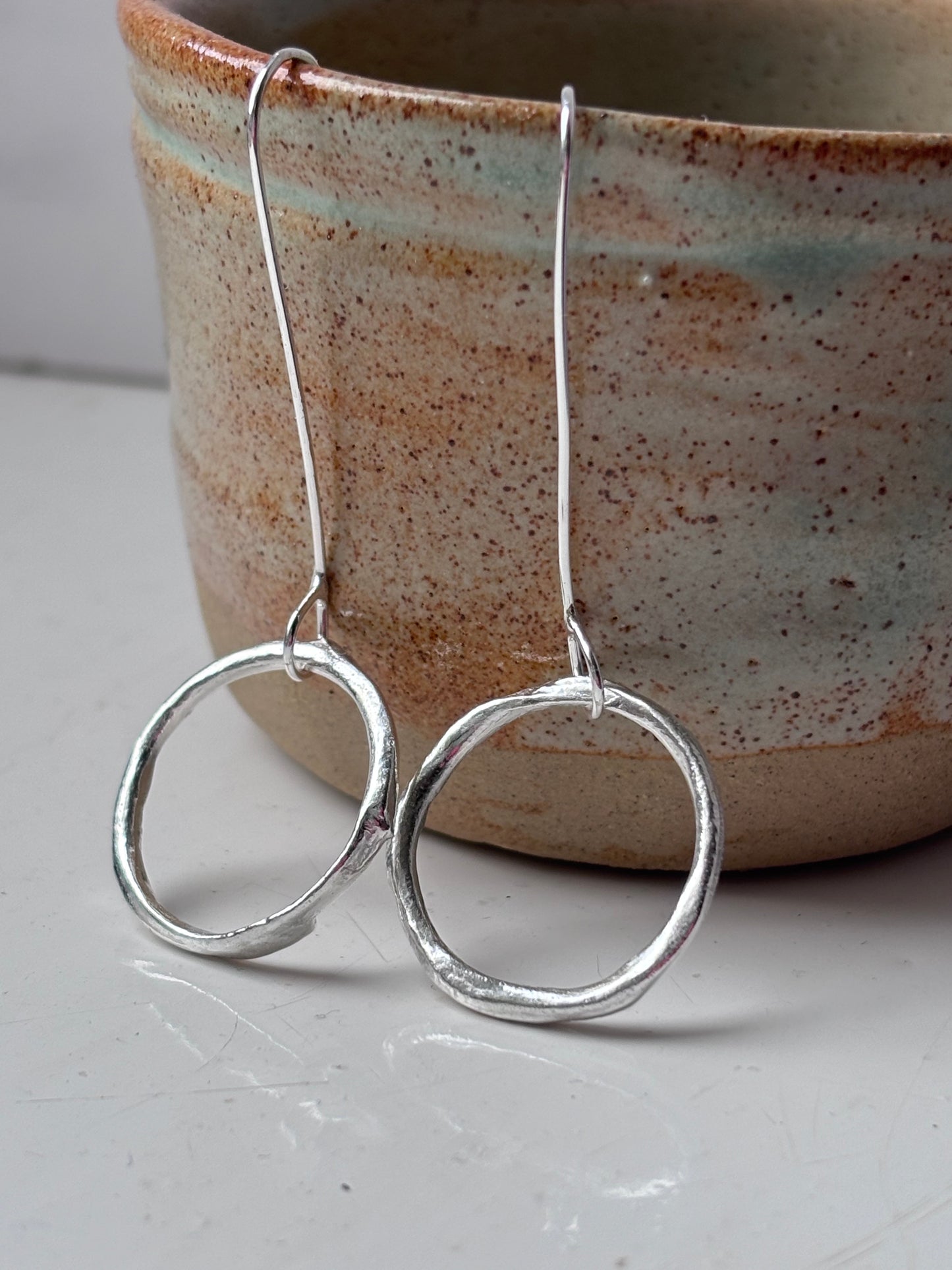 Molten Silver Hoops