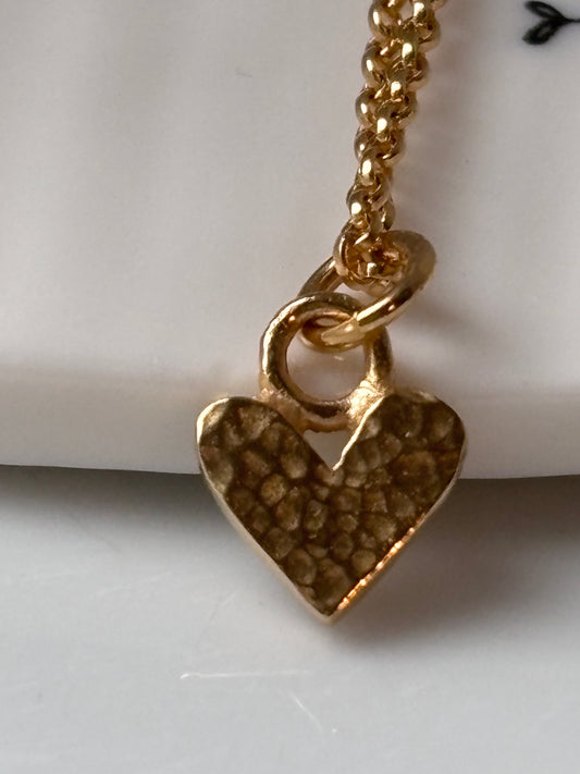 Gold mini heart charm necklace