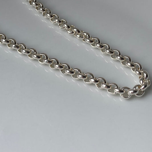 Chunky silver belcher chain.