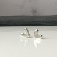 Silver heart studs